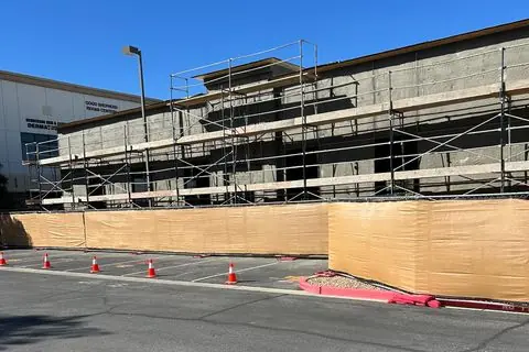 Scaffolding and weather barrier on the exterior of The Industry Studios, Henderson NV