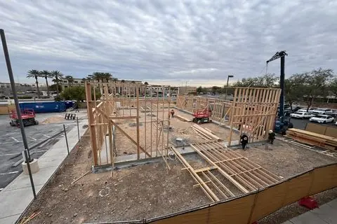 Wood wall framing rising on the foundation at The Industry Studios, Henderson NV
