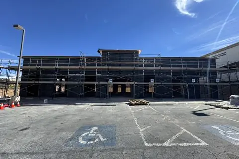 Scaffolding on the parking-lot side of The Industry Studios during stucco work, Henderson NV