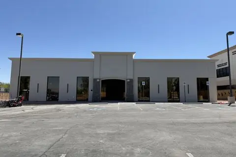 The Industry Studios parking-lot facade with finished stucco before signage, Henderson NV