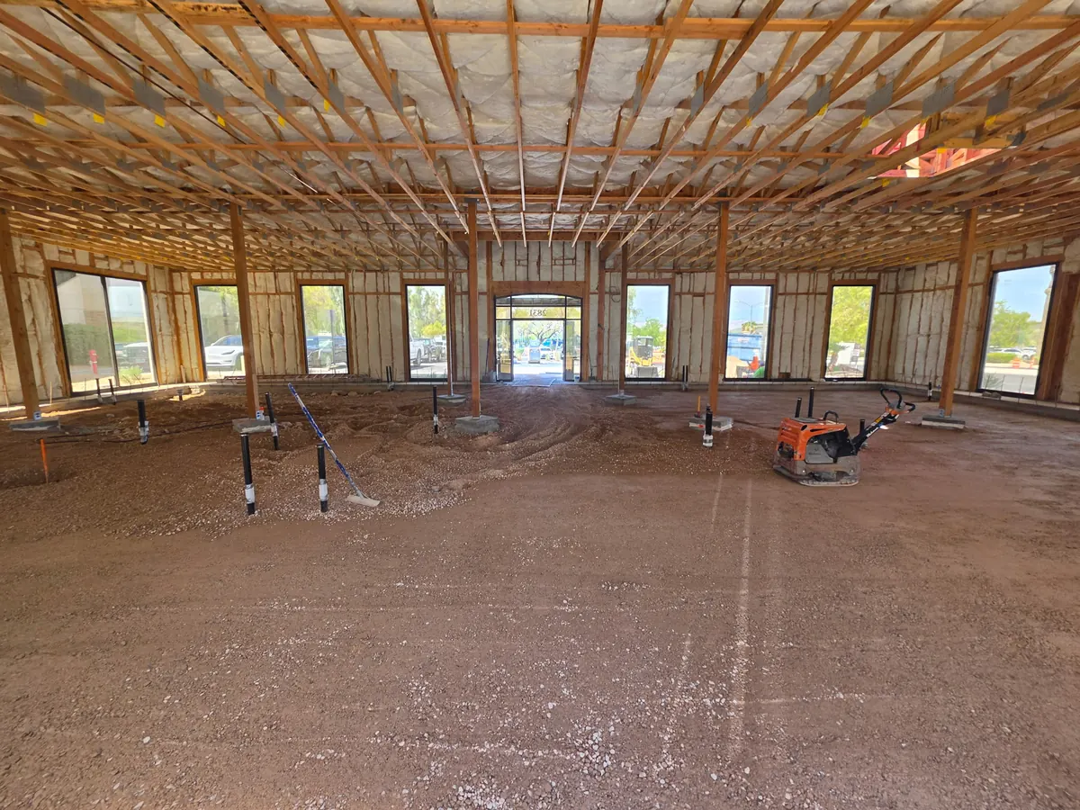 Underground plumbing stubbed up and the floor graded inside The Industry Studios, Henderson NV