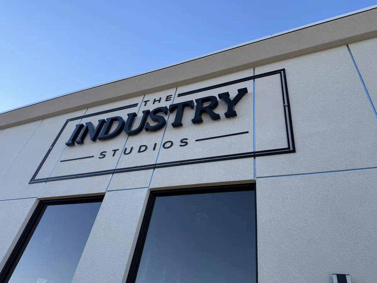 The Industry Studios sign on the finished building at 2831 W Horizon Ridge Pkwy, Henderson NV
